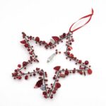Decorazione stella perline rosse 17cm
